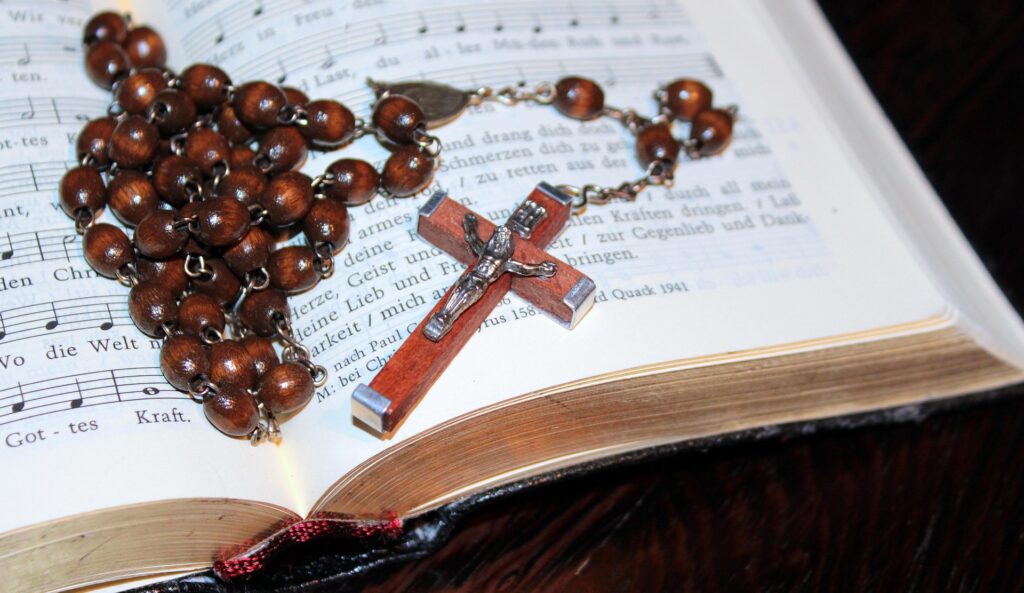 Catholic rosary beads with crucifix used for prayer