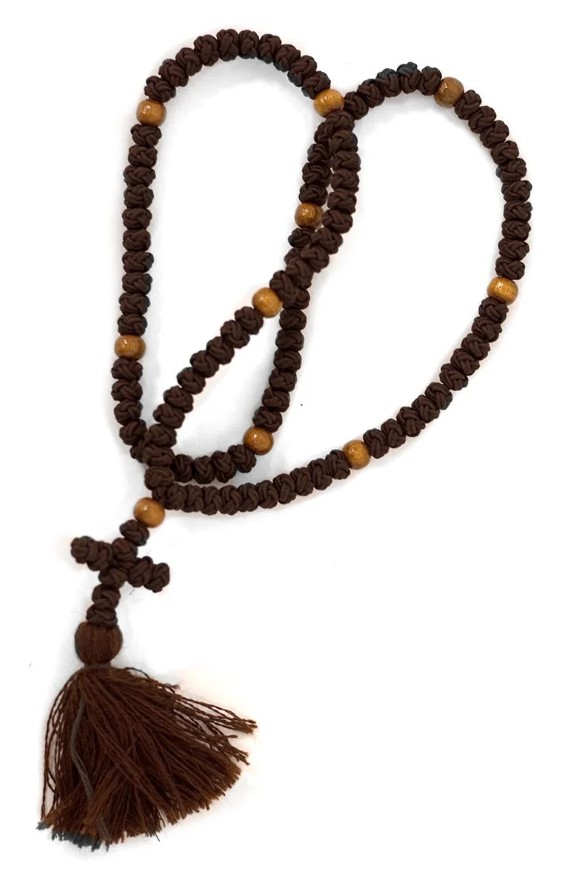 Orthodox Christian prayer rope with knotted cord and cross used for repeating the Jesus Prayer