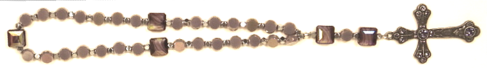 Protestant prayer beads with cross showing cruciform and week bead structure used for flexible prayer