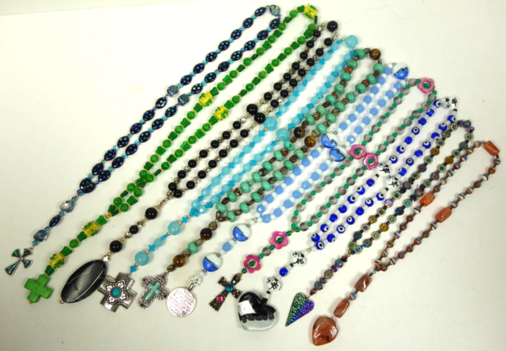 Collection of handcrafted Protestant prayer beads in different designs and colors