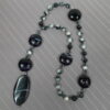 Dolomite Jasper Protestant prayer beads with black glass cruciform beads, hematite accents, and striped black onyx pendant
