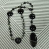 Dolomite Jasper Protestant prayer beads with black glass cruciform beads, hematite accents, and striped black onyx pendant