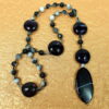 Dolomite Jasper Protestant prayer beads with black glass cruciform beads, hematite accents, and striped black onyx pendant