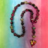 Glittery Purple Heart Protestant prayer beads with purple crackle glass beads, butterfly spacers, and iridescent heart pendant