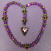 Purple Leaved Heart Protestant prayer beads with purple crackle glass, hematite leaf spacers, and iridescent heart pendant