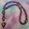 Purple Leaved Heart Protestant prayer beads with purple crackle glass, hematite leaf spacers, and iridescent heart pendant