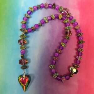 Purple Leaved Heart Protestant prayer beads with purple crackle glass, hematite leaf spacers, and iridescent heart pendant
