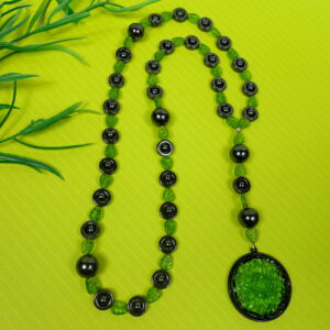 Green Leaves Hematite prayer bead necklace with hematite roller beads, green glass leaf spacers, and floral pendant