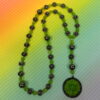 Green Leaves Hematite prayer bead necklace with hematite roller beads, green glass leaf spacers, and floral pendant
