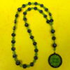 Green Leaves Hematite prayer bead necklace with hematite roller beads, green glass leaf spacers, and floral pendant