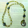 Lime Snails Protestant prayer bead necklace with ceramic snail beads, jade spacers, and abalone shell snail pendant