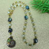 Lime Snails Protestant prayer bead necklace with ceramic snail beads, jade spacers, and abalone shell snail pendant