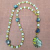 Lime Snails Protestant prayer bead necklace with ceramic snail beads, jade spacers, and abalone shell snail pendant