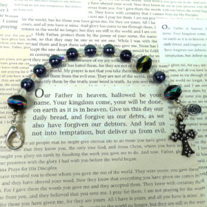 Black Crystal Rainbow Protestant chaplet bracelet with black glass beads, rainbow accents, antique goldtone metal cross, and heart pendant