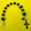 Black Crystal Rainbow Protestant chaplet bracelet with black glass beads, rainbow accents, antique goldtone metal cross, and heart pendant