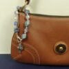 Blue Pink Agate Protestant chaplet bracelet with agate beads, silvertone metal cross, and The Lord Be With You shield pendant