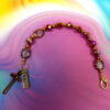 Faceted Burgundy Protestant chaplet bracelet with burgundy glass beads, coppertone accents, cross pendant, and It Is Well With My Soul pendant
