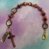 Faceted Burgundy Protestant chaplet bracelet with burgundy glass beads, coppertone accents, cross pendant, and It Is Well With My Soul pendant