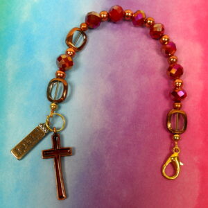 Faceted Burgundy Protestant chaplet bracelet with burgundy glass beads, coppertone accents, cross pendant, and It Is Well With My Soul pendant