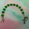 Green Butterflies Protestant chaplet bracelet with green butterfly beads, silvertone metal cross, and Love pendant