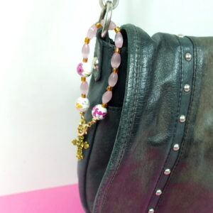 Pink Roses Protestant chaplet bracelet with rose ceramic beads, pink cat’s-eye glass, goldtone metal cross, and BE STILL AND KNOW pendant
