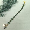 Rainbow Crosses Protestant chaplet bracelet with iridescent glass beads, silver-plated cross beads, and Believe pendant
