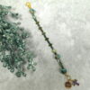 Rainbow Crosses Protestant chaplet bracelet with iridescent glass beads, silver-plated cross beads, and Believe pendant