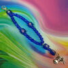 Rosy Blue Protestant Prayer Bead Bracelet with lampworked rose Cruciform beads, blue glass Week beads, cross, and Love pendant