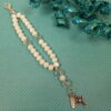 White Believe Protestant Prayer Bead Bracelet with iridescent Cruciform beads, white glass Week beads, filigreed cross, and Believe pendant