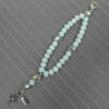 White Believe Protestant Prayer Bead Bracelet with iridescent Cruciform beads, white glass Week beads, filigreed cross, and Believe pendant