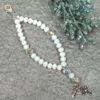 White Believe Protestant Prayer Bead Bracelet with iridescent Cruciform beads, white glass Week beads, filigreed cross, and Believe pendant