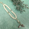 White Believe Protestant Prayer Bead Bracelet with iridescent Cruciform beads, white glass Week beads, filigreed cross, and Believe pendant